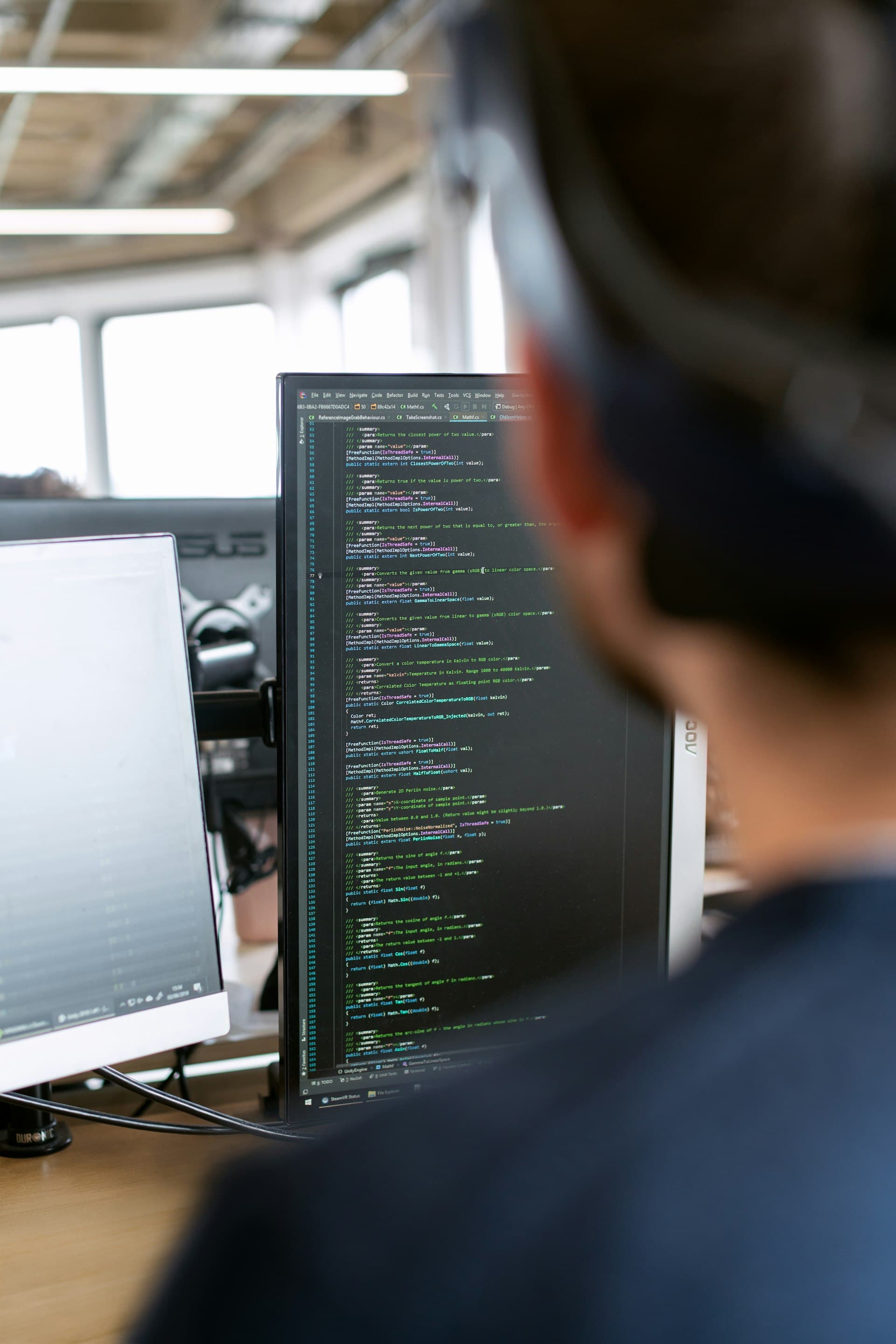 Engineer with tablet at a wind farm